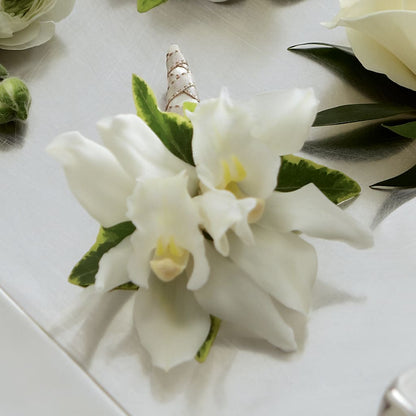 White Mini Cymbidium Boutonniere –  New Rochelle Florist, New Rochelle NY